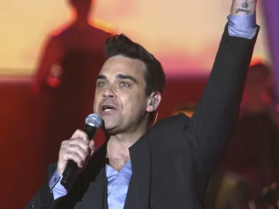 Robbie Williams bo zvezda julijskega koncerta v Trstu. / Foto: AP