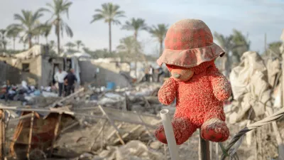 FILED - 05 December 2024, Palestinian Territories, Khan Yunis: A toy is seen among destroyed tents following an Israeli attack targeted an Internally displaced person (IDP) camp in the Mawasi Khan Younis area, southern Gaza Strip last night. Photo: Mohammed Skaik/News Images via ZUMA Press Wire/dpa