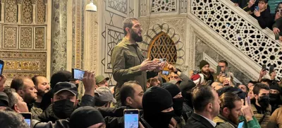 Top rebel commander Abu Mohammed al-Golani speaks to a crowd at Ummayad Mosque in Damascus, after Syrian rebels announced that they have ousted President Bashar al-Assad, Syria December 8, 2024. REUTERS/Mahmoud Hassano   TPX IMAGES OF THE DAY