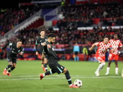 10 December 2024, Spain, Girona: Liverpool's Mohamed Salah scores his side's first goal during the UEFA Champions League soccer match between Girona and Liverpool at Estadi Montilivi. Photo: Liam Mcburney/PA Wire/dpa