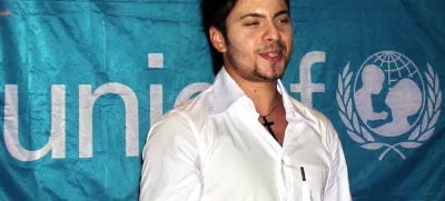 **FILE**Macedonian pop star Tose Proeski is seen by the UNICEF flag in Skopje, in this file photo from Aug. 31, 2004, the day when he becomes a regional goodwill ambassador for the UN agency for children, UNICEF.  26-year old Proeski was killed early Tuesday, Oct. 16, 2007, in a car crash at Nova Gradiska, 100 kilometres east of Zagreb, Croatia. (AP Photo)