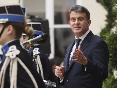 Newly named Minister for Overseas Affairs Emmanuel Valls delivers his speech after the hand over ceremony, in Paris, Tuesday, Dec. 24, 2024. (AP Photo/Thomas Padilla)