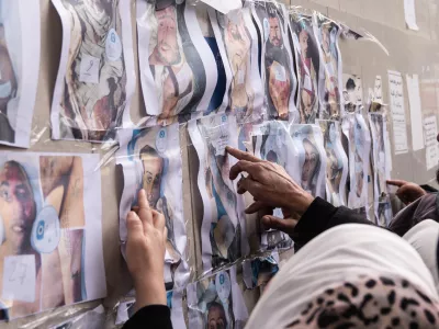 DAMASCUS, SYRIA - DECEMBER 11: (EDITOR'S NOTE: Image depicts death) People searching for missing family members gather outside at Al Mujtahid Hospital to identify bodies who were tortured to death by the Assad regime in Damascus, Syria on December 11, 2024. The bodies of people who appear to have been tortured to death by the ousted regime of Bashar al-Assad in Syria—responsible for torturing hundreds of thousands—have recently been discovered. Around 40 bodies, showing clear signs of torture, were found in body bags at the Harasta military hospital morgue and were later transferred to Al Mujtahid Hospital for autopsies. Efforts to identify the victims are ongoing. Photographs of the bodies are being displayed on the walls. Relatives initially try to identify the victims from these images, then go inside the morgue to search for their loved ones among the tortured bodies. Emin Sansar / AnadoluNo Use USA No use UK No use Canada No use France No use Japan No use Italy No use Australia No use Spain No use Belgium No use Korea No use South Africa No use Hong Kong No use New Zealand No use Turkey