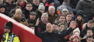 Liverpool's manager Arne Slot reacts during the English Premier League soccer match between Liverpool and Fulham, at Anfield stadium in Liverpool, England, Saturday, Dec. 14, 2024. (AP Photo/Jon Super)