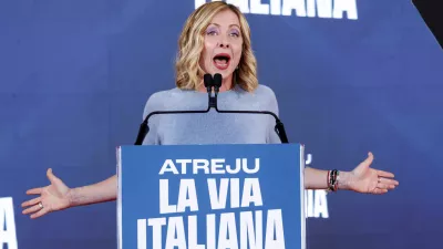 Italian Premier Giorgia Meloni gives her speech during Atreju 2024, the Italian Way, event organized by the Fratelli d'Italia (Brothers of Italy) party at the Circo Massimo, Rome, Sunday, Dec. 15, 2024. (Roberto Monaldo/LaPresse via AP)