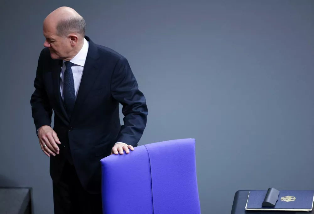 German Chancellor Olaf Scholz reacts, on the day of a confidence vote called by him to pave way for snap election, at lower house of parliament Bundestag in Berlin, Germany, December 16, 2024. REUTERS/Liesa Johannssen