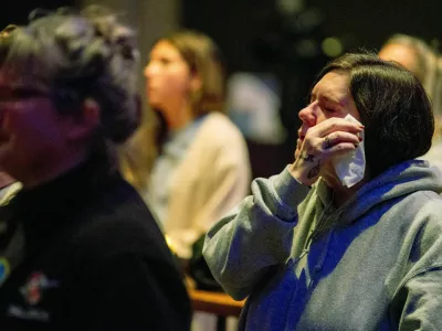 Worshipers at Blackhawk Church gather to pray for victims and survivors of a shooting at Madison's Abundant Life Christian School, in Middleton, Wisconsin, U.S. December 16, 2024. REUTERS/Cullen Granzen