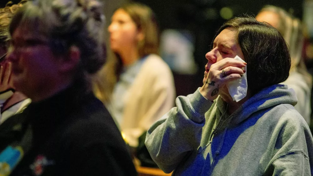 Worshipers at Blackhawk Church gather to pray for victims and survivors of a shooting at Madison's Abundant Life Christian School, in Middleton, Wisconsin, U.S. December 16, 2024. REUTERS/Cullen Granzen