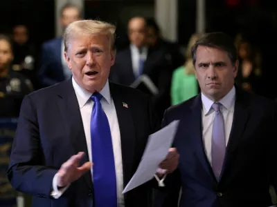 FILE PHOTO: Former U.S. President Donald Trump, alongside his attorney Todd Blanche, speaks to the media as he arrives for his criminal trial for allegedly covering up hush money payments at Manhattan Criminal Court on May 30, 2024 in New York City. Michael M. Santiago/Pool via REUTERS/File Photo