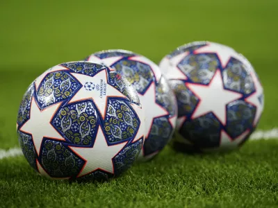 The Official UEFA Champions League match balls lie on the pitch ahead of the Champions League, round of 16, first leg soccer match between Liverpool and Real Madrid at the Anfield stadium in Liverpool, England, on Feb. 21, 2023. (AP Photo/Jon Super, File)