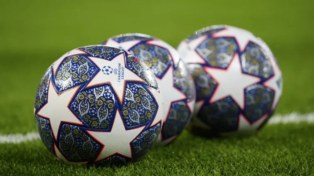 The Official UEFA Champions League match balls lie on the pitch ahead of the Champions League, round of 16, first leg soccer match between Liverpool and Real Madrid at the Anfield stadium in Liverpool, England, on Feb. 21, 2023. (AP Photo/Jon Super, File)