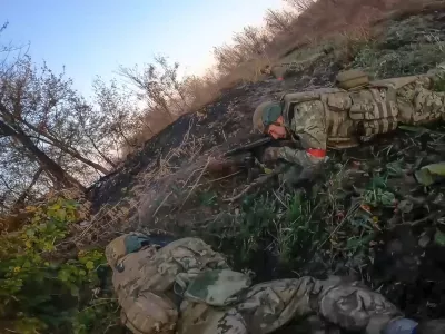 In this image taken from a video released by the Russian Defense Ministry on Thursday, Nov. 7, 2024, Russian Army soldiers fight with Ukrainian Armed forces in the Sudzhansky district of the Kursk region of Russia. (Russian Defense Ministry Press Service via AP)