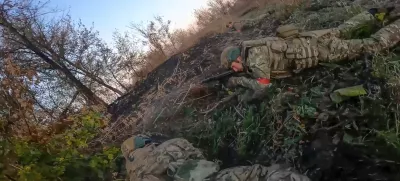 In this image taken from a video released by the Russian Defense Ministry on Thursday, Nov. 7, 2024, Russian Army soldiers fight with Ukrainian Armed forces in the Sudzhansky district of the Kursk region of Russia. (Russian Defense Ministry Press Service via AP)