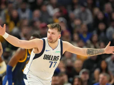 Dec 15, 2024; San Francisco, California, USA; Dallas Mavericks guard Luka Doncic (77) gestures after scoring against the Golden State Warriors during the fourth quarter at Chase Center. Mandatory Credit: Darren Yamashita-Imagn Images