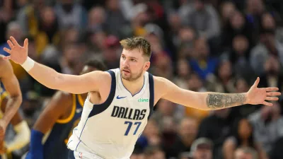 Dec 15, 2024; San Francisco, California, USA; Dallas Mavericks guard Luka Doncic (77) gestures after scoring against the Golden State Warriors during the fourth quarter at Chase Center. Mandatory Credit: Darren Yamashita-Imagn Images