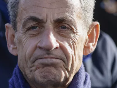 FILE - Former French President Nicolas Sarkozy looks on as he attends a ceremony at the Arc de Triomphe, as part of the commemorations marking the105th anniversary of the Nov. 11, 1918 Armistice, ending World War I, Saturday, Nov. 11, 2023 in Paris. (Ludovic Marin/Pool via AP, File)