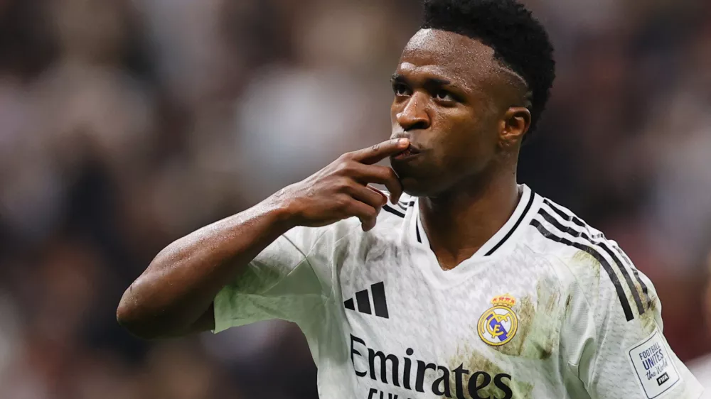 Soccer Football - Intercontinental Cup - Final - Real Madrid v Pachuca - Lusail Stadium, Lusail, Qatar - December 18, 2024 Real Madrid's Vinicius Junior celebrates scoring their third goal REUTERS/Ibraheem Al Omari