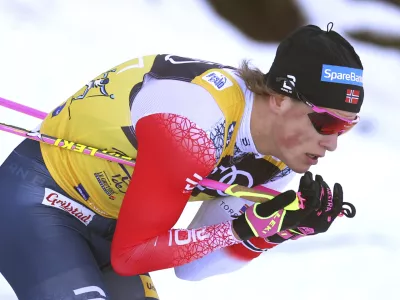 Johannes Hoesflot Klaebo from Norway in action during the men's 15 km mass start classic at the Cross Country skiing world cup in Oberstdorf, Germany, Friday, Dec. 31, 2021. (Karl-Josef Hildenbrand/dpa via AP)