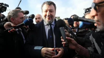 Italian Deputy Prime Minister Matteo Salvini speaks to media upon his arrival at Pagliarelli bunker courthouse for a hearing in the trial over his 2019 decision to prevent more than 100 migrants from landing in the country, in Palermo, Italy, December 20, 2024. REUTERS/Igor Petyx