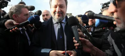 Italian Deputy Prime Minister Matteo Salvini speaks to media upon his arrival at Pagliarelli bunker courthouse for a hearing in the trial over his 2019 decision to prevent more than 100 migrants from landing in the country, in Palermo, Italy, December 20, 2024. REUTERS/Igor Petyx