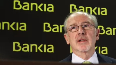 President of Spanish bank Bankia Rodrigo Rato arrives for a news conference in Madrid, in this February 10, 2012 file photo. Rato stepped down on May 7, 2012 as chairman of ailing Spanish lender Bankia SA, helping clear the way for a rescue plan that the government hopes will persuade international investors of the country's financial stability. REUTERS/Andrea Comas/Files (SPAIN - Tags: BUSINESS HEADSHOT)