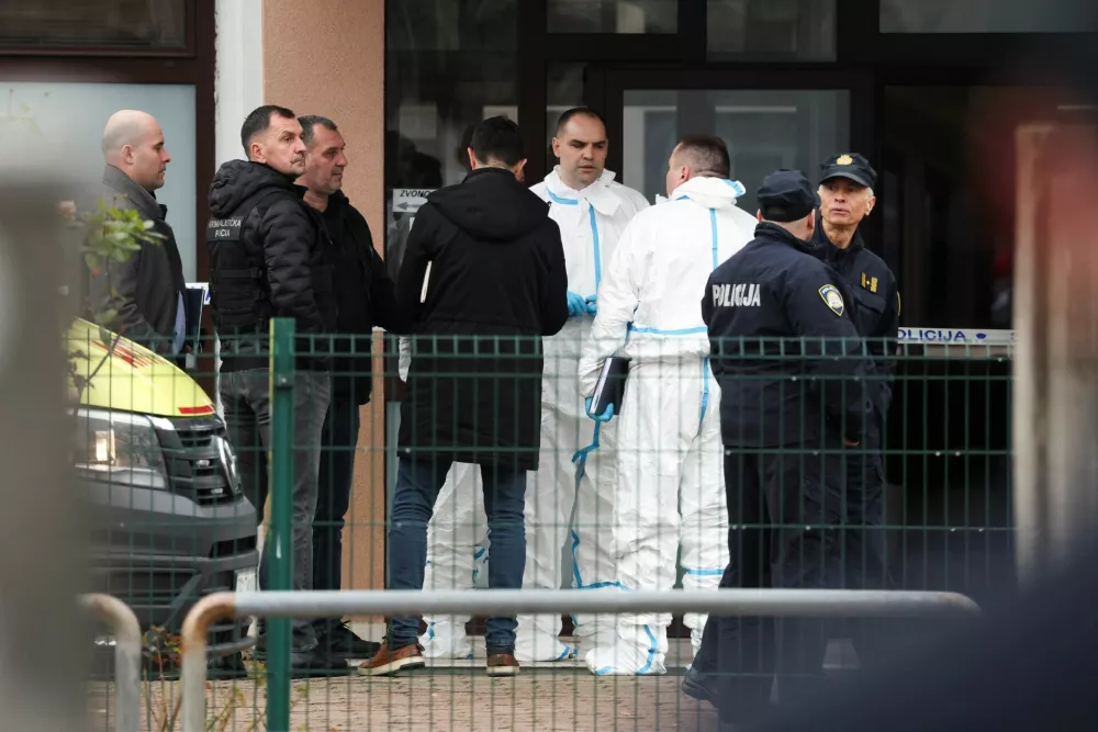 Police officers stand, following a knife attack in a primary school, in Zagreb, Croatia, December 20, 2024. REUTERS/Antonio Bronic