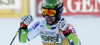 Alpine Skiing - FIS Alpine Ski World Cup - Men's Downhill - Val Gardena, Italy - December 21, 2024 Slovenia's Martin Cater reacts after his run REUTERS/Leonhard Foeger