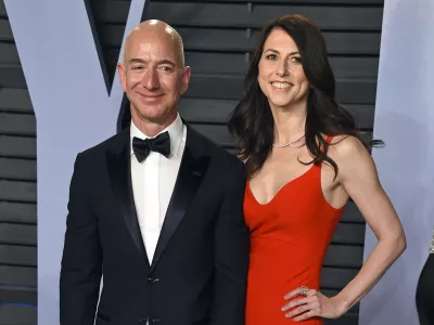 ﻿FILE - In this March 4, 2018 file photo, Jeff Bezos and wife MacKenzie Bezos arrive at the Vanity Fair Oscar Party in Beverly Hills, Calif. The founder of Amazon and his wife have made their largest political donation to date, giving  million to With Honor, a nonpartisan political-action committee devoted to helping military veterans running for Congress. (Photo by Evan Agostini/Invision/AP, File)