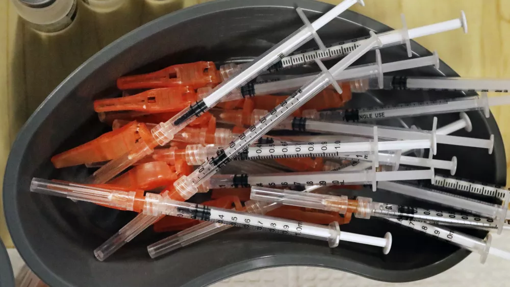 FILE - Pre-loaded syringes of the COVID-19 vaccine are ready for use in New Orleans on Jan. 25, 2022. (AP Photo/Ted Jackson, File)