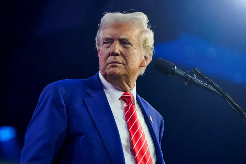 FILE PHOTO: U.S. President-elect Donald Trump attends Turning Point USA's AmericaFest in Phoenix, Arizona, U.S., December 22, 2024. REUTERS/Cheney Orr/File Photo