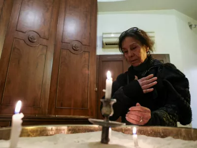 A faithful prays on the day of the Christmas morning Mass at the Lady of Damascus church, following the ousting of Syria's Bashar al-Assad, in Damascus, Syria, December 25, 2024. REUTERS/Amr Abdallah Dalsh