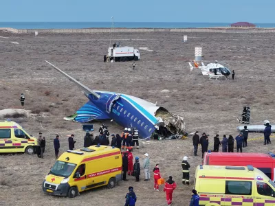 A drone view shows emergency specialists working at the crash site of an Azerbaijan Airlines passenger plane near the city of Aktau, Kazakhstan December 25, 2024. REUTERS/Azamat Sarsenbayev