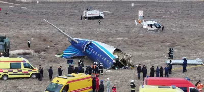 A drone view shows emergency specialists working at the crash site of an Azerbaijan Airlines passenger plane near the city of Aktau, Kazakhstan December 25, 2024. REUTERS/Azamat Sarsenbayev