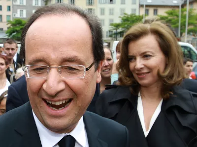 French President Francois Hollande, left, and his companion Valerie Trierweiler, in Tulle, southwestern France, Saturday, June 9, 2012, on the eve of the first round of the French general election. The second round will take place on June 17 to elect the 14th National Assembly of the 5th Republic. (AP Photo/Bob Edme)