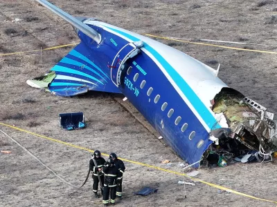 FILE PHOTO: A drone view shows emergency specialists working at the crash site of an Azerbaijan Airlines passenger plane near the city of Aktau, Kazakhstan December 25, 2024. REUTERS/Azamat Sarsenbayev/File Photo