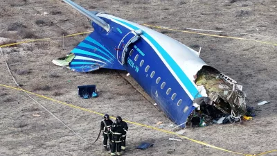 FILE PHOTO: A drone view shows emergency specialists working at the crash site of an Azerbaijan Airlines passenger plane near the city of Aktau, Kazakhstan December 25, 2024. REUTERS/Azamat Sarsenbayev/File Photo