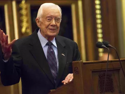 FILE - Former President Jimmy Carter speaks on the eradication of the Guinea worm, Feb. 3, 2016, at the House of Lords in London. (Neil Hall/Pool Photo via AP, File)