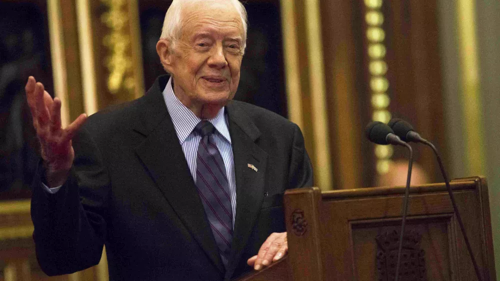 FILE - Former President Jimmy Carter speaks on the eradication of the Guinea worm, Feb. 3, 2016, at the House of Lords in London. (Neil Hall/Pool Photo via AP, File)