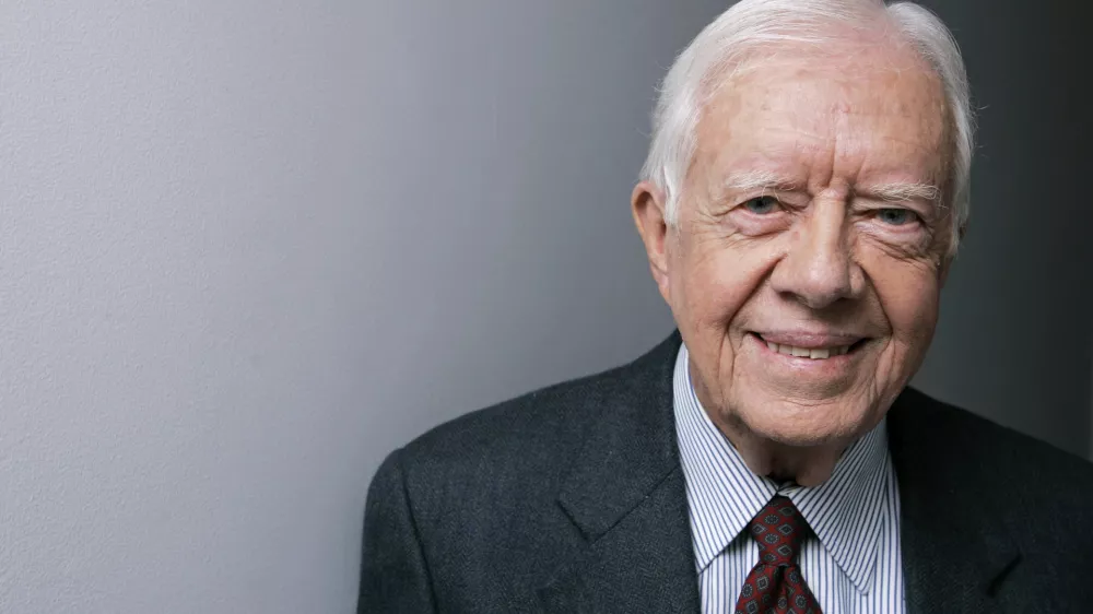 FILE - Former President Jimmy Carter poses for a portrait during the Toronto International Film Festival, Sept. 10, 2007, in Toronto. (AP Photo/Carolyn Kaster, File)