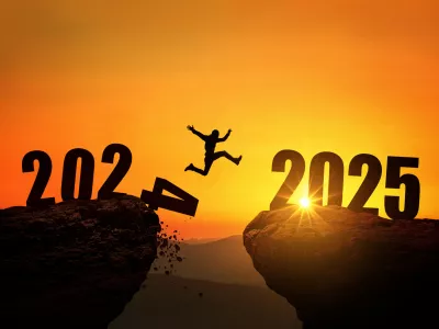 Man jumping on cliff 2025 over the precipice with stones at amazing sunset. New Year's concept. 2024 falls into the abyss. Welcome 2025. People enters the year 2025, creative idea.