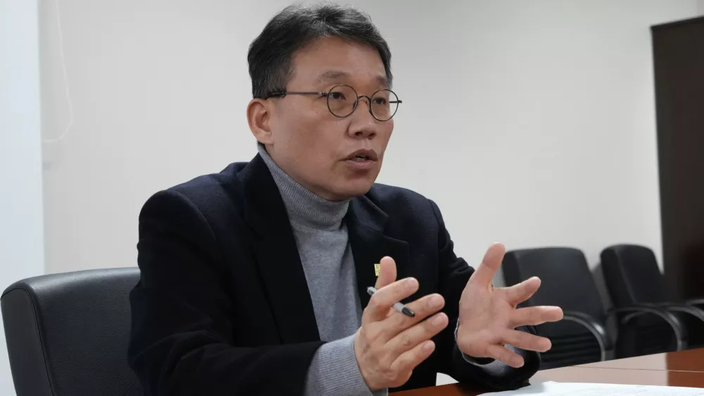 Chung Ick-Joong, the president of the National Center for the Rights of the Child, speaks during an interview with The Associated Press in Seoul, South Korea, Tuesday, Dec. 24 2024. (AP Photo/Ahn Young-joon)