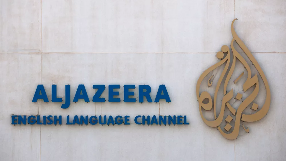 FILED - 05 June 2012, Qatar, Doha: The lettering and logo of the Arab news channel Al-Jazeera can be seen on the company's premises. The Palestinian Authority (PA) has suspended the Qatari-based Al Jazeera television news channel and its employees from operating in the Israeli-occupied West Bank. Photo: Tim Brakemeier/dpa