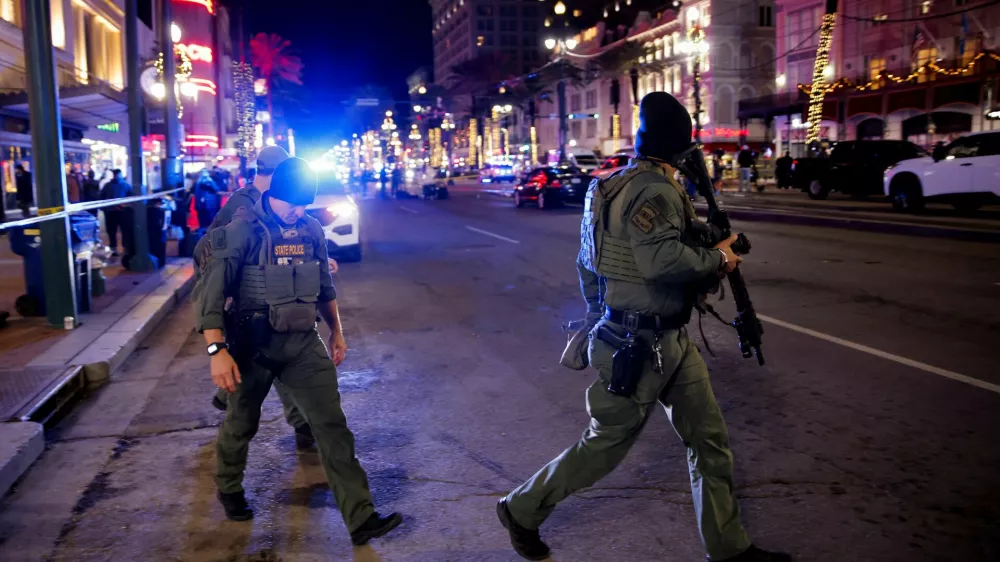 Police patrol the area near the scene where a vehicle drove into a crowd during New Year's celebrations, in New Orleans, Louisiana, U.S., January 1, 2025. REUTERS/Eduardo Munoz