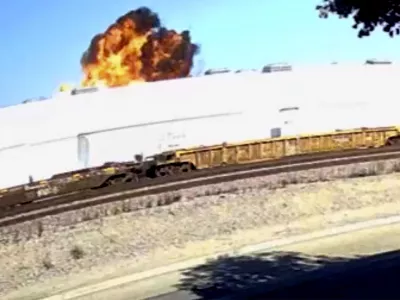 This image taken from video, shows an explosive fire as a small plane crashes into a commercial building in Fullerton, Calif. on Thursday, Jan. 2, 2025. (RUCCI FORGED via AP)