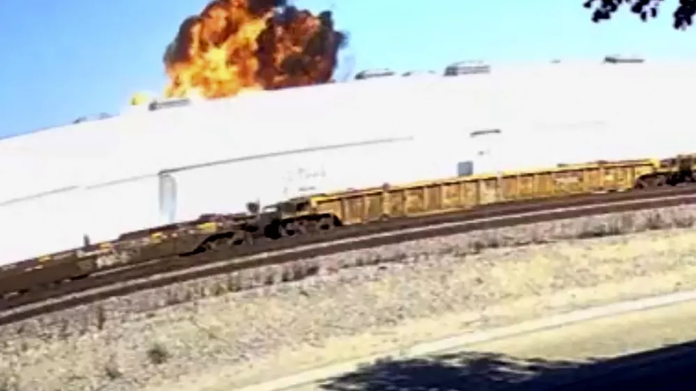 This image taken from video, shows an explosive fire as a small plane crashes into a commercial building in Fullerton, Calif. on Thursday, Jan. 2, 2025. (RUCCI FORGED via AP)