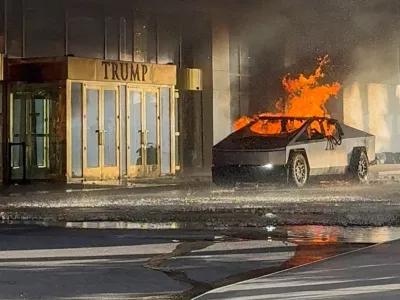 Flames rise from a Tesla Cybertruck after it exploded outside the Trump International Hotel Las Vegas, in Las Vegas, Nevada, U.S., January 1, 2025 in this screengrab taken from a social media video. Alcides Antunes/via REUTERS THIS IMAGE HAS BEEN SUPPLIED BY A THIRD PARTY. MANDATORY CREDIT. THIS PICTURE WAS PROCESSED BY REUTERS TO ENHANCE QUALITY. AN UNPROCESSED VERSION HAS BEEN PROVIDED SEPARATELY.   TPX IMAGES OF THE DAY