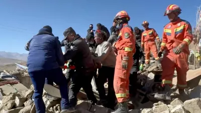 Rescue teams tend to casualties in the aftermath of an earthquake in a location given as Shigatse City, Tibet Autonomous Region, China, January 7, 2025, in this screengrab obtained from a handout video. Tibet Fire and Rescue/Handout via REUTERS  THIS IMAGE HAS BEEN SUPPLIED BY A THIRD PARTY. NO RESALES. NO ARCHIVES. MANDATORY CREDIT