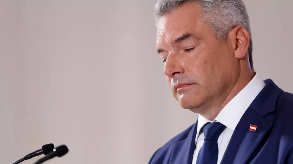 Head of Peoples Party (OEVP) and Chancellor Karl Nehammer addresses the media during the presentation of their election program in Vienna, Austria, September 5, 2024. REUTERS/Leonhard Foeger