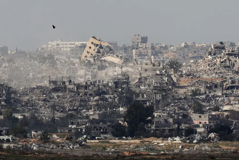 Buildings lie in ruin in Beit Hanoun in the Gaza Strip, amid the ongoing conflict between Israel and Hamas, as seen from southern Israel, January 5, 2025. REUTERS/Kai Pfaffenbach   TPX IMAGES OF THE DAY