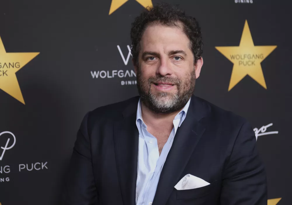 FILE - Brett Ratner arrives at an event in Beverly Hills, Calif., April 26, 2017. (Photo by Willy Sanjuan/Invision/AP, File)